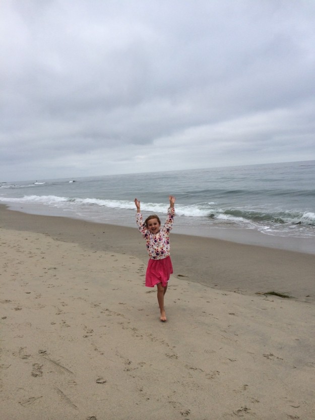 Christina running on beach